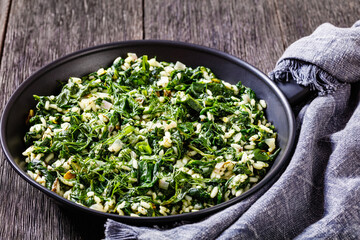 Spanakorizo, Greek spinach and rice pilaf in pan