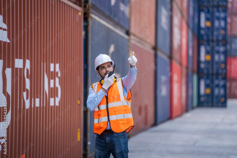 Poster Professional container yard workers checking stock for loading in the container yard warehouse,Container yard warehouse inspection,Cargo Shipping Import and Export industry.
