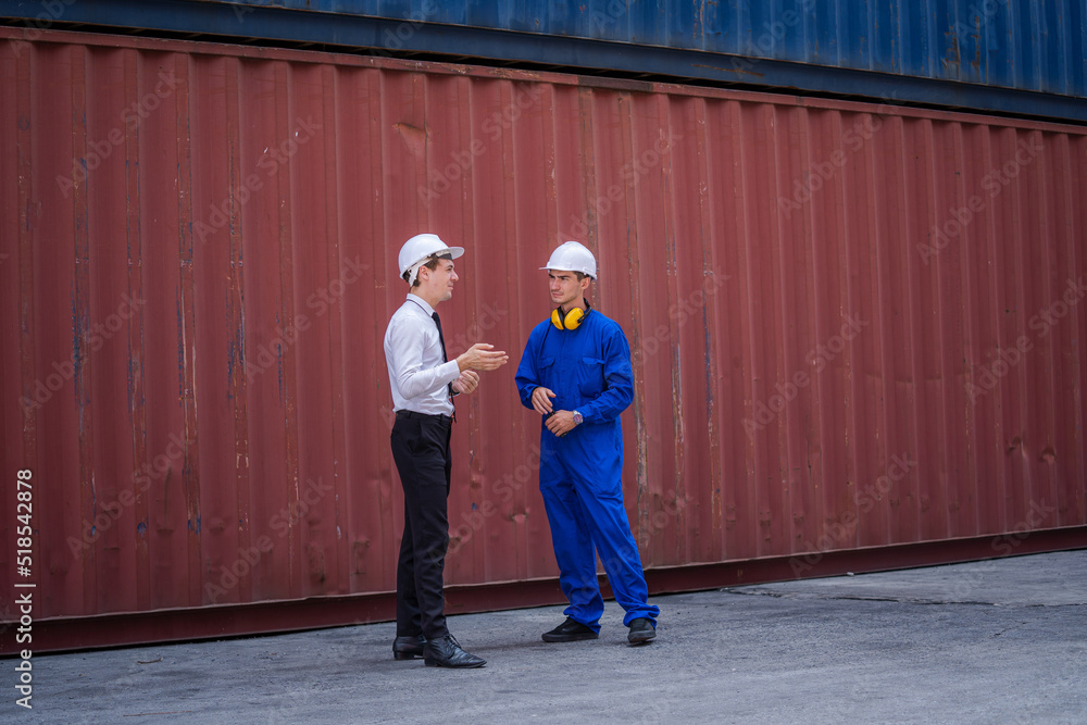 Poster Manager and Technicians working checking stock into container for loading at container yard warehouse.