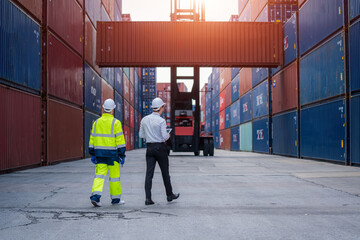Industrial engineer and inspector or safety supervisor working in container terminal,Container in...