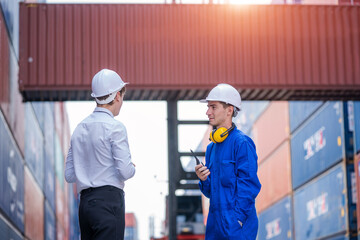 two workers in warehouse