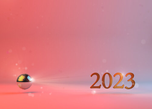 2023 new year party invitation with pink lights and disco dance glitter ball. Bright, fun and very high resolution image for print and screen.