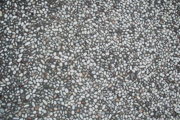 floor background texture made of river stone or coral mixed with cement
