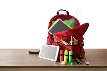 School backpack full of school supplies and electronic books