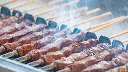 Delicious skewers are grilled over charcoal.
