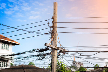 Electrical cables and communication wires on electric pole
