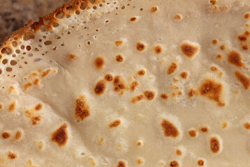 Pan fried pancake as a background.