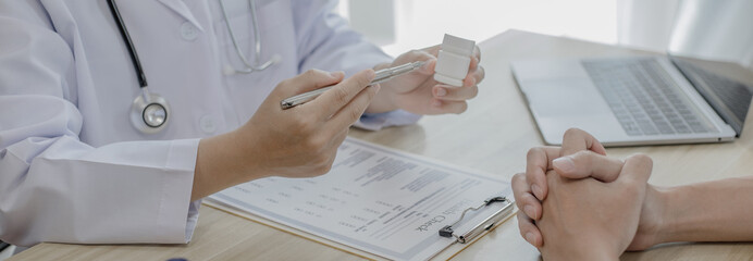 Medical consultation, Doctors advise and give advice.medicines are given to patients in the examination room of a hospital or clinic, Diagnosis, Medical service, Healthy lifestyle concept..