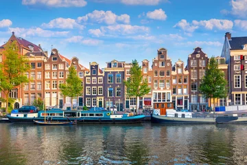 Foto op Aluminium Amsterdam. Panoramic view of the historic city center of Amsterdam. Traditional houses and bridges of Amsterdam. An early quiet morning.  Europe, Netherlands, Holland, Amsterdam. © Taiga