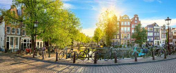 Panoramic view of a quiet morning Amsterdam. Houses, bridges, bicycles - old Amsterdam. Lovely...