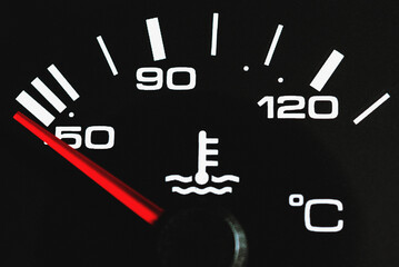 Car coolant temperature gauge temperature gauge in car dashboard showing cold.closeup.