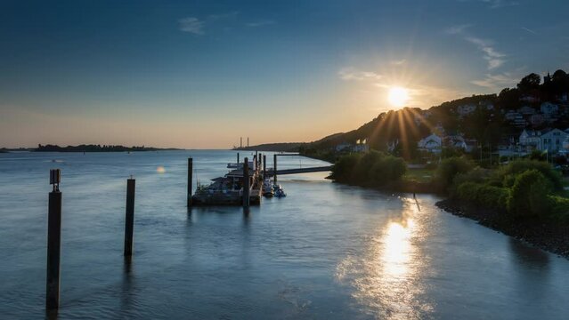 Time lapse Hamburg, Germany: Sunset in Hamburg Blankenese near shore pontoon "op'n Bulln"