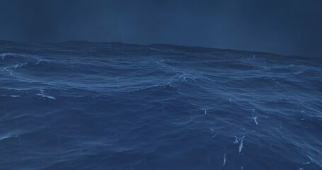 ocean waves with clear sky and sun rays on blue water