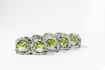 Sushi roll california in sesame seeds with shrimp.