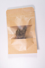 Dried cannabis buds on white background