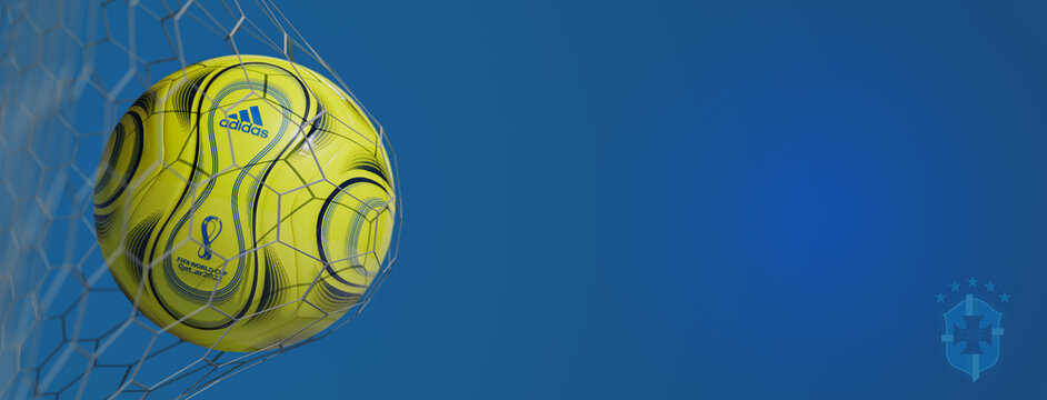 Guilherand-Granges, France - July 22, 2022. FIFA World cup Qatar 2022. Soccer ball in net with official logo of Brazilian Football Confederation. 3D rendering.
