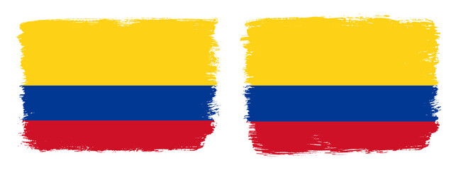 A set of two vector brush flags of Colombia with abstract shape brush stroke effect