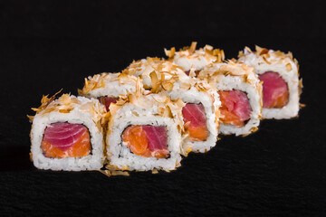 Rolls with rice, tuna, salmon and sprinkles