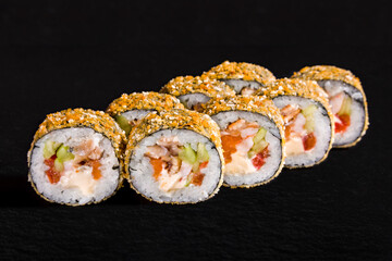 Warm breaded roll with nori, rice, cucumber, salmon, eel