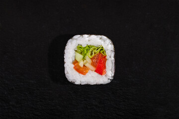 Rolls with nori, rice, frisse salad, cucumber