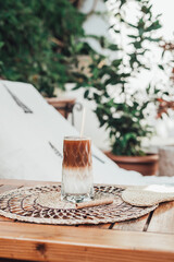Refreshing iced latte coffee. Cold summer drink background