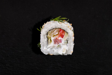 Roll with sesame seeds, dill, rice, pepper, lettuce