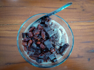 Brenebon ice. Indonesian ice drink served with red soybean, milk, and chocolate jelly