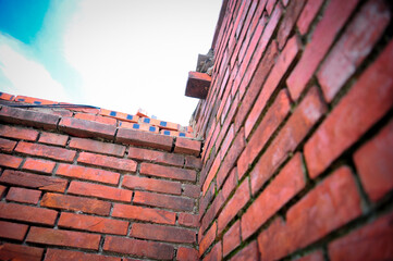 Obraz na płótnie Canvas a wall of red bricks