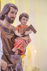 Fototapeta premium Saint Joseph and Child Jesus catholic religious statue