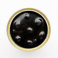 Canned black olives on a white background.