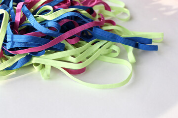 Pile of elastic band close-up. Various elastic cord for clothes.