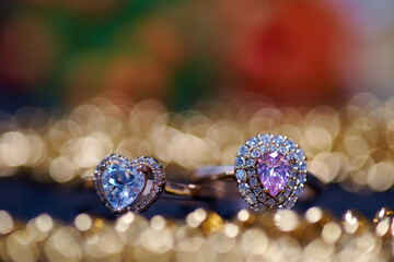 The diamond rings with the golden light bokeh