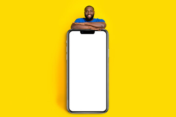 Full length body size view of handsome trendy cheery guy showing copy space ad bargain isolated on...