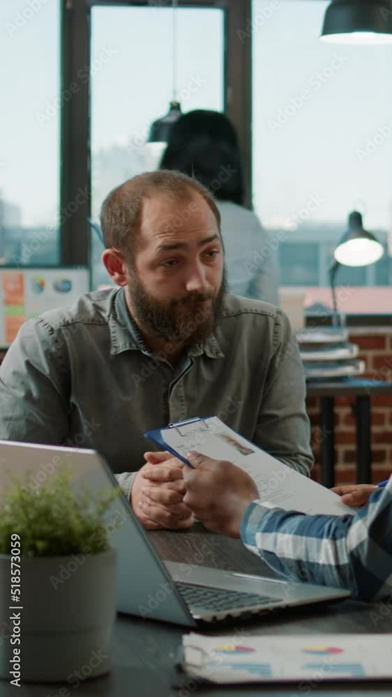Poster vertical video: diverse group of men attending job interview to discuss hiring and information about