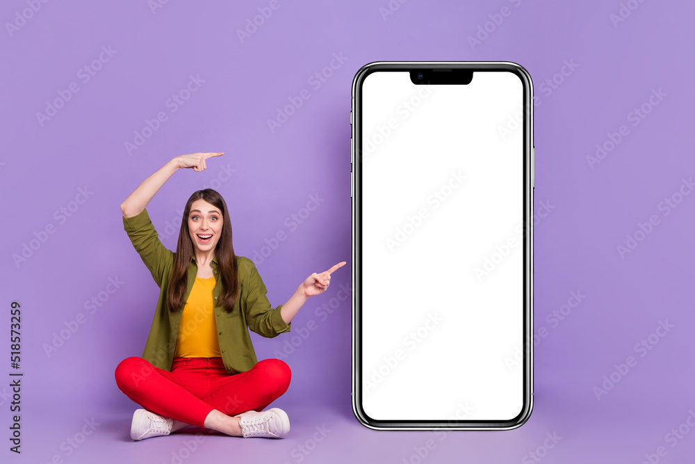 Poster portrait of attractive cheery girl demonstrating copy space ui network advert web isolated over viol