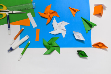Indian tricolour paper hand craft ideas for Indian national day celebration and events. children's school crafting concept.
