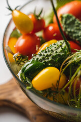 fresh vegetables in a glass plate in water, organic veggie food, healthy eating, weight loss food