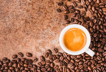 Coffee cup top view copy space background cup of espresso and coffee beans top view. 