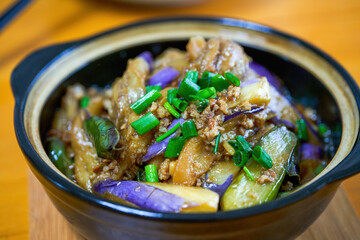 A delicious Chinese home-cooked dish, salted fish and eggplant in clay pot