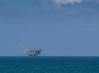 Gas production platform in the sea against the blue sky..copy space