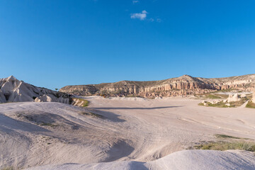 Landscape of Rose Valley in Cappadocia, with a pink desert landscape, at sunset