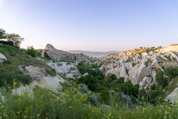 Pidgeon Valley panorama in evening light with Ushisar Castle on the horizon