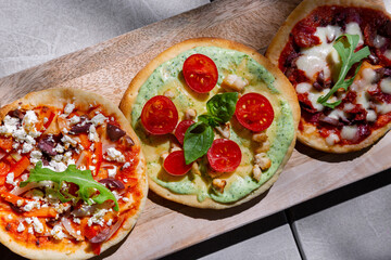 Three mini pizzas