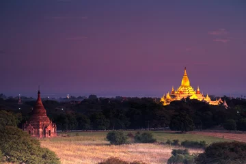 Fotobehang Golden pagoda at night in Myanmar. © sippakorn