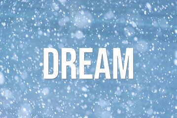 DREAM - word on the background of the sky with clouds.