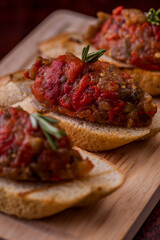Three bruschetta with eggplant caviar