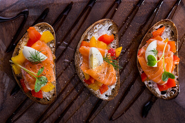 Three bruschetta with salmon