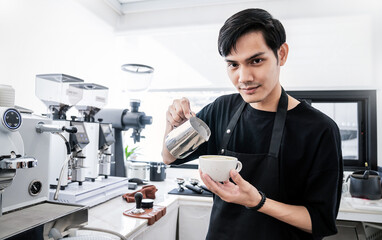 Startup successful small business owner sme handsome asian korean man driving coffee in cafe. Portrait young man barista cafe, owner SME entrepreneur blogger, slow bar Indian or Arab business concept