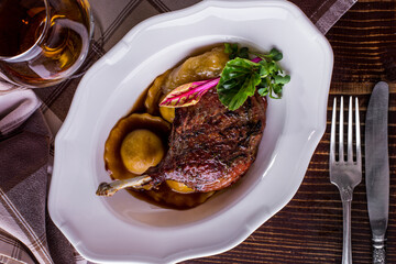Grilled duck leg with bone