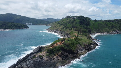 Promthep Cape is one of the most photographed locations in Phuket. Every evening, tour buses, scooters and private cars sweep through Rawai Beach and up the island's southernmost hill to watch the sun